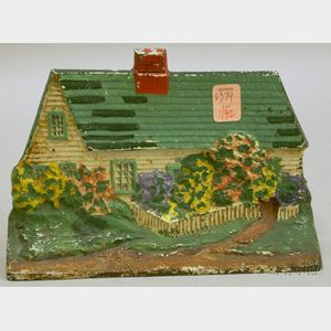 Eastern Specialty Painted Cast Iron Cottage Doorstop
