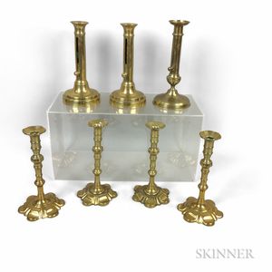 Seven French and English Brass Candlesticks