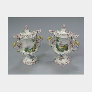 Pair of French Faience Lidded Urns.