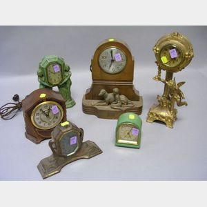 Six Art Deco Figural and Assorted Table Clocks.