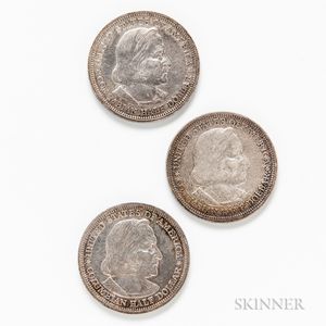 Three Circulated 1893 Columbian Commemorative Half Dollars. 