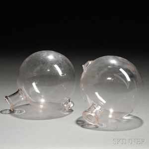 Two Free Blown Colorless Glass Globes