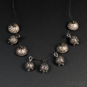 Nine Persian Silver Charms