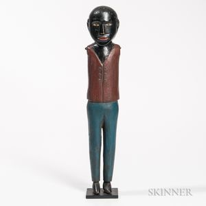 Carved and Polychrome Painted Figure of Black Man
