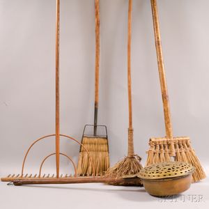 Three Brooms, a Rake, and a Brass Bed Warmer. 