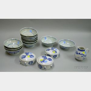 Chinese Set of Eleven Blue and White Decorated Porcelain Bowls, Three Covered Jars, and a Small Jug.