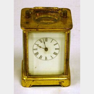 Waterbury Clock Co. Brass and Glass Repeating Carriage Clock.