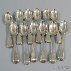 Set of Twelve Victorian Fiddle-handled Silver Table/Serving Spoons