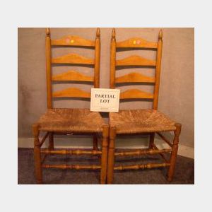 Large Pine Trestle-foot Table and a Set of Eight Ladder-back Chairs with Rush Seats.