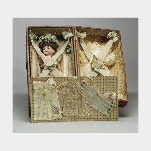 Small German Bisque Head Doll in Presentation Trunk with Wardrobe
