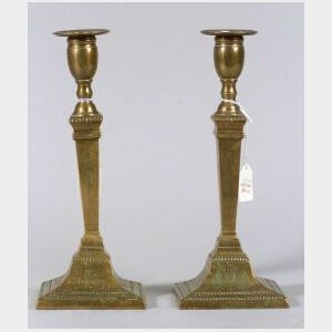 Pair of Engraved Bronze Candlesticks