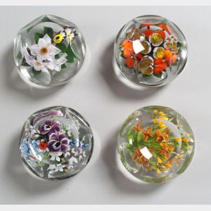 Four Rick Ayotte Faceted Glass Paperweights