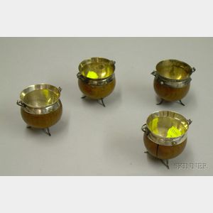 Set of Four English Sterling Silver Mounted Oak Kettle-form Salts.