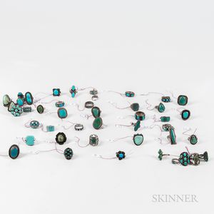 Forty-four Navajo and Zuni Silver and Turquoise Rings