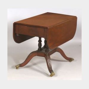 Late Federal Mahogany Carved Pembroke Table, Boston or Salem, Massachusetts, 1815-20, the rectangular top with hinged rounded leaves wh