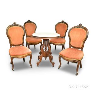 Set of Four Rococo Revival Carved Walnut Side Chairs and a Renaissance Revival Marble-top Table. 