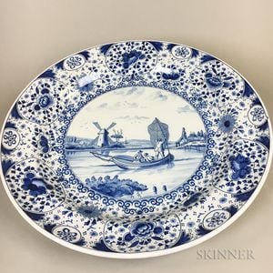 Large Delft Blue and White Ceramic Charger Depicting a Fishing Scene