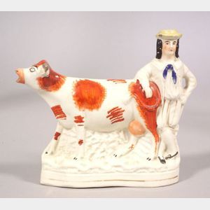 Staffordshire Pottery Cow and Farmer Figural Group