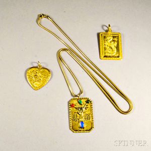 Three Gold Asian Pendants