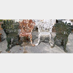 Two Pairs of Painted Cast Iron Morning Glory Pattern Garden Chairs