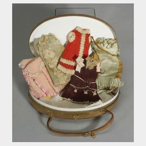 Wardrobe for a 7-inch Doll in an Oval Presentation Box
