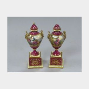 Pair of Austrian Handpainted Dorinda and Alegra Porcelain Covered Vases.