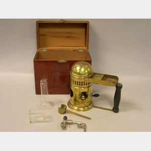 Brass Inhalator in Mahogany Case.