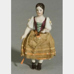 Unusual Tiny Jointed All Bisque Girl with Molded Regional Clothes