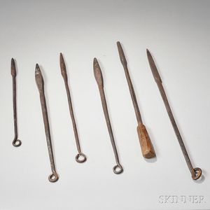 Six Wrought Iron Toddy Irons