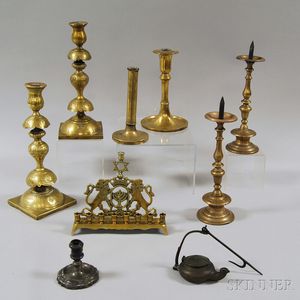 Nine Mostly Brass Lighting Devices