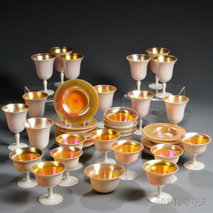 Forty-two Pieces of Gold Iridescent Glassware, Mostly Steuben
