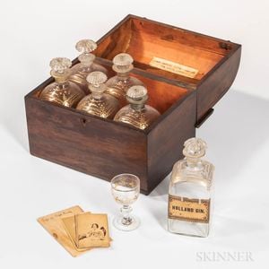The Captain Samuel Cook Mahogany Veneer Liquor Chest and Six Gilt-decorated Blown Glass Bottles