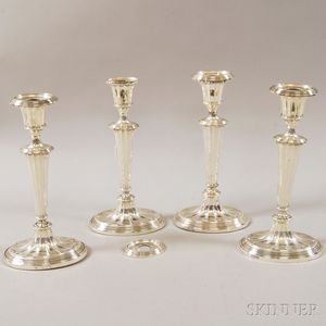 Suite of Four Weighted English Silver Candlesticks