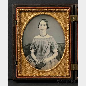 Quarter Plate Daguerreotype of a Young Woman Holding a Union Case