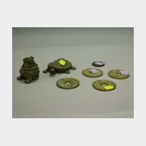 Brass Coins, Turtle, and a Foo Dog.