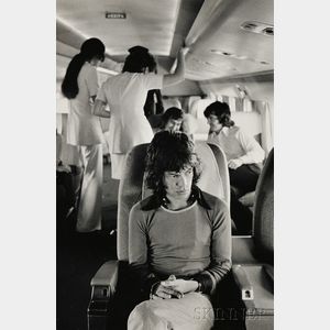 Jim Marshall (American, 1936-2010) Mick Jagger on Tour Plane
