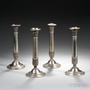 Assembled Set of Four Weighted Continental Silver Candlesticks