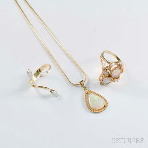Two 14kt Gold and Opal Rings and an Opal Pendant