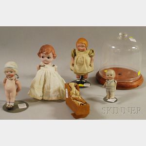 Four Small All-Bisque Dolls and Glass Dome