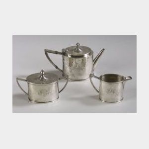 Arts and Crafts Hammered Three-piece Teaset
