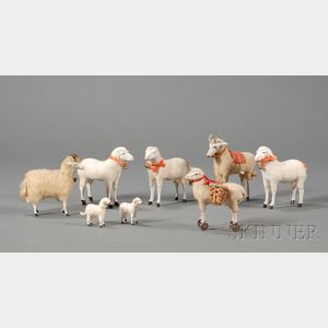 Eight Miniature Sheep Figures