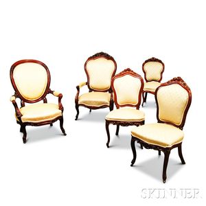 Five Rococo Revival Carved Walnut Chairs