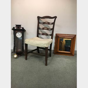 Georgian Mahogany Ribbon-back Side Chair, a Carved Walnut Wall Clock, and a Maple Ogee Mirror. 