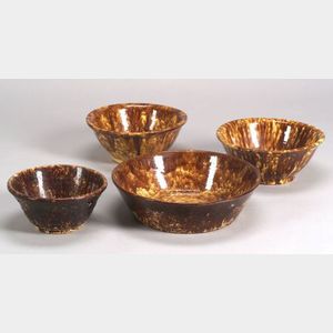 Four Rockingham Glazed Bowls