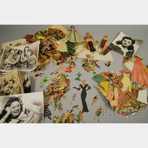 Collection of 1940s Movie Star and Other Paper Dolls and Nine 1940s Black and White Movie Studio Publicity Photographs