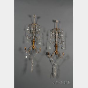 Pair of Empire-style Gilt Bronze and Colorless Cut Glass Two Light Wall Sconces