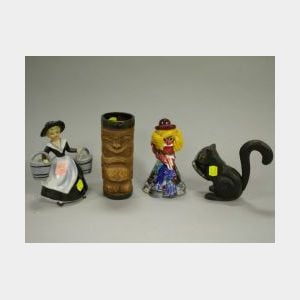 Tiki Mug, Cast Iron Squirrel Nut Cracker, Italian Glass Clown Paperweight and Porcelain Figure.