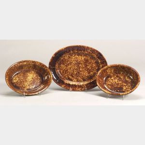 Two Rockingham Glazed Oval Baking Dishes and an Oval Platter