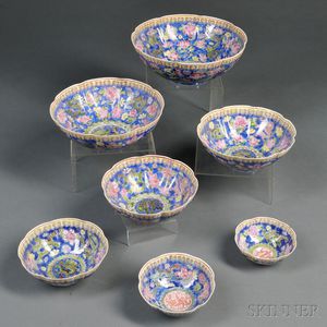 Set of Nine Graduating Eggshell Porcelain Lobed Dragon Bowls
