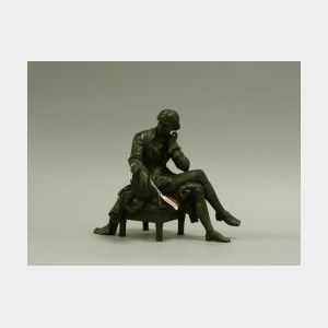 Bronze Figure of a Seated Gentleman, late 19th century,